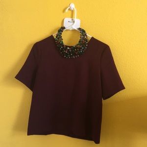 Maroon boxy shirt . (Necklace not included )
